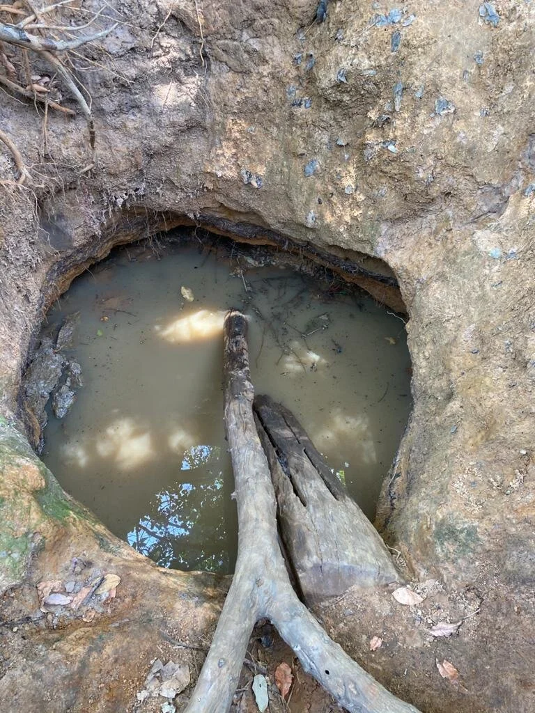An abandoned and broken water pump in a rural village community