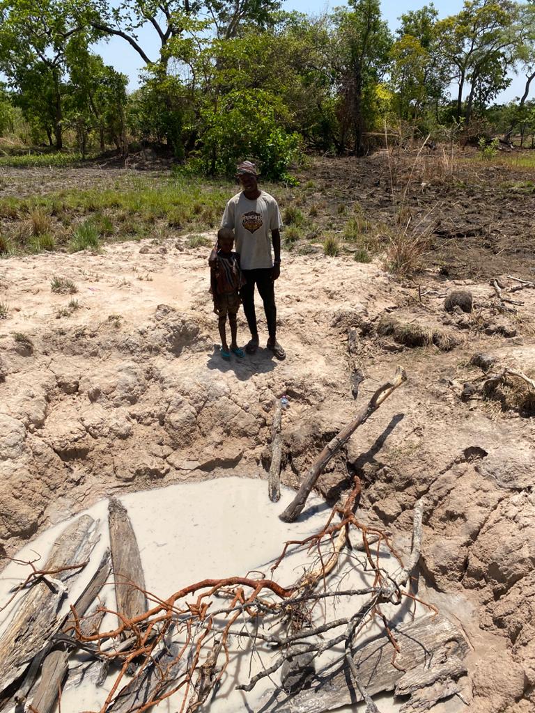 A newly constructed clean water well pump in a rural farming community
